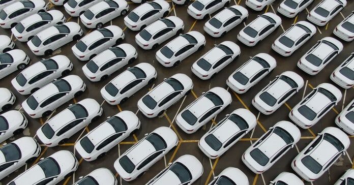 Cars leaving the factory are waiting at the port for international trade